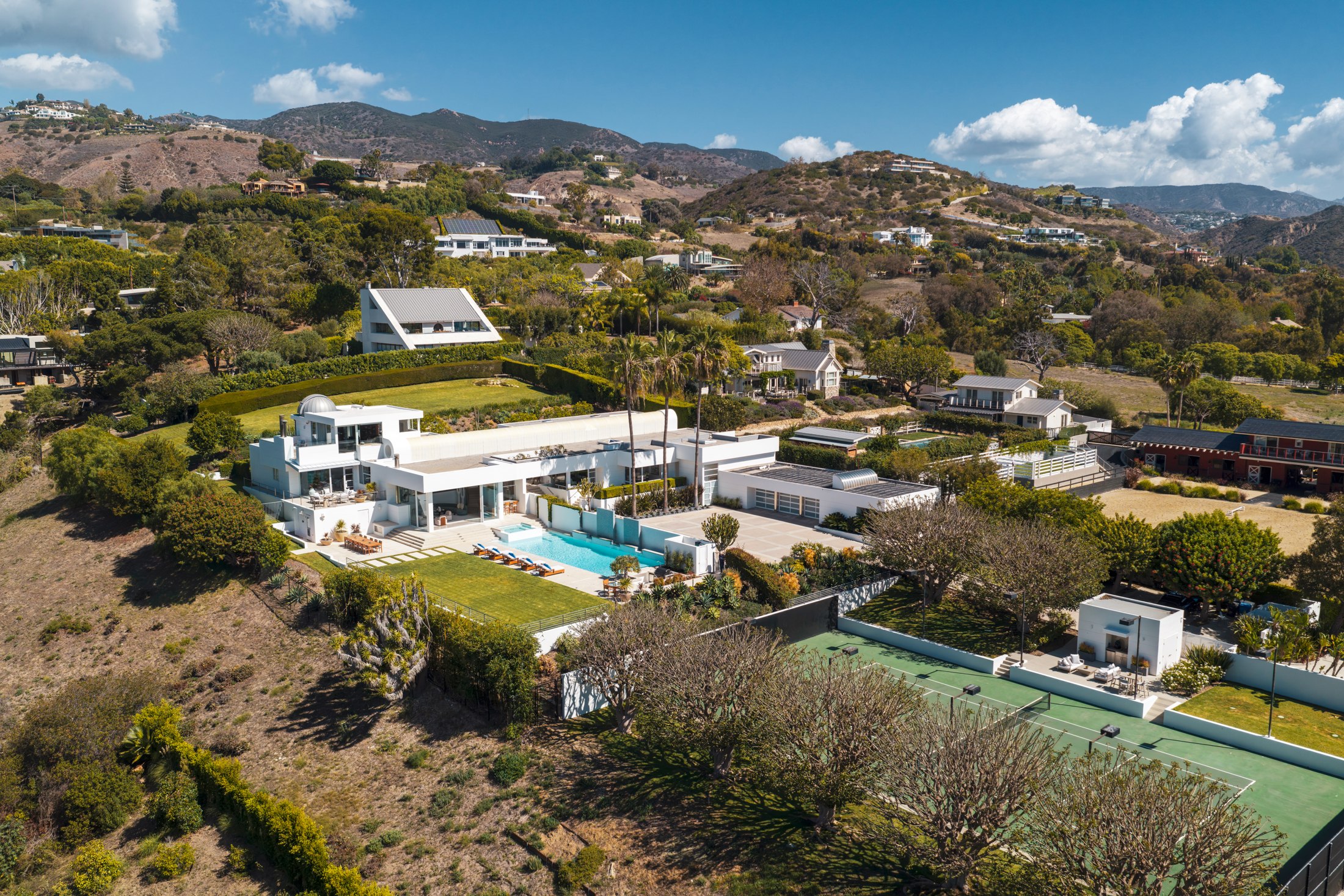 Aerial view of the estate with the Santa Monica Mountains and the Pacific